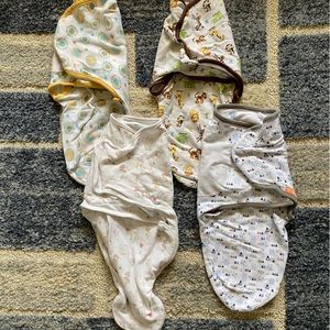 Lot of 4 velcro swaddles, size SM/MED (7-14 lbs)